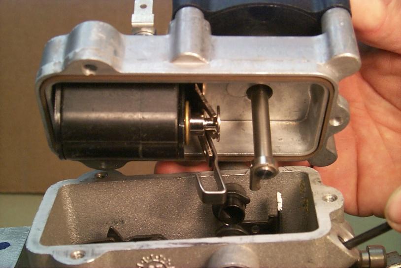 LCS/Stanadyne D Pump Manual 26098 b) drive the internal linkage toward minimum fuel in order to position the linkage hook in a manner that will allow the ESO solenoid to properly engage the linkage