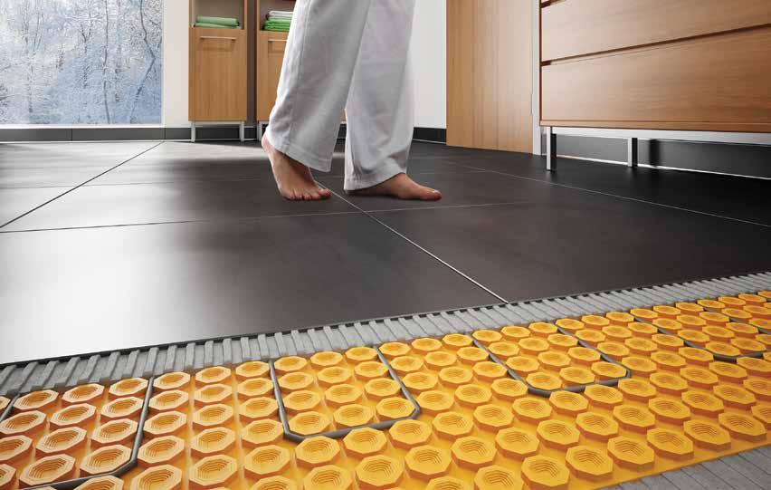 Luxurious and Warm DITRA-HEAT Electric Floor Warming System One feature that immediately separates an ordinary bathroom from an extraordinary one is a warm tiled floor.