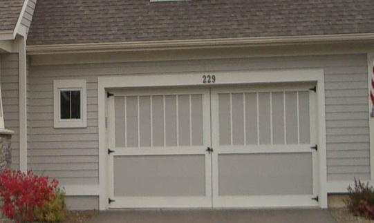 5.3.7 GARAGE DOORS Must be contemporary versions of Carriage House or Renaissance door with simple lines that are compatible with the home designs.