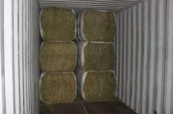 Double-compressed bales can fit determined by the storage needs and the ease of delivering more forage into shipping containers increasing the value to them to the livestock.