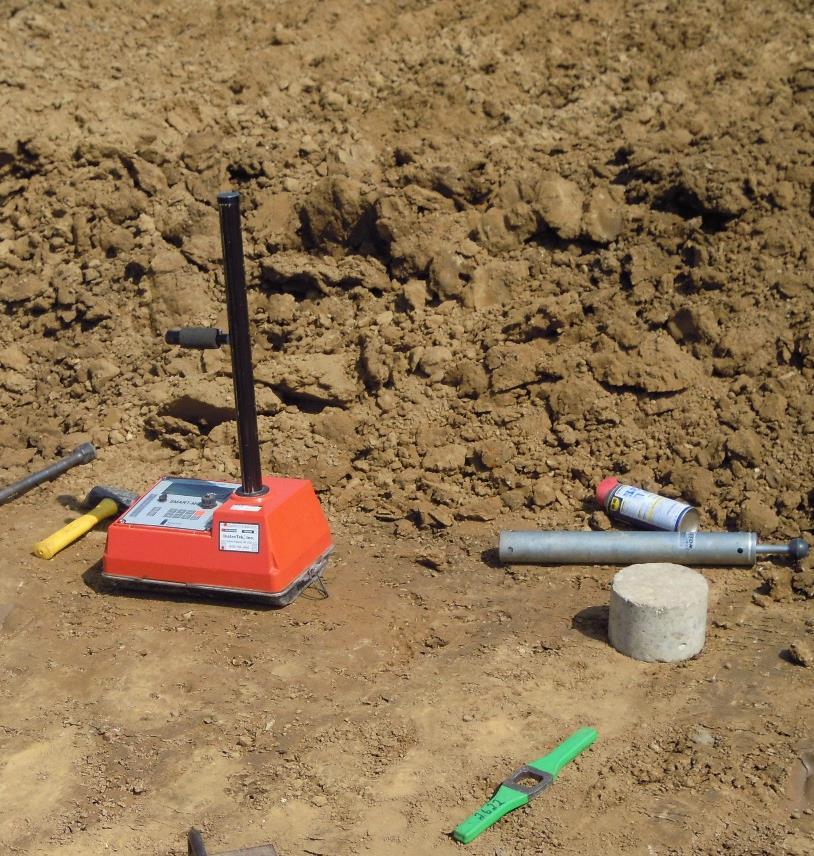 S 1015 - Compaction Testing Sample soil from area directly under the gauge Proctor mold on a concrete block or surface when