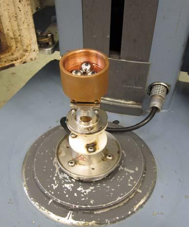 39 (a) (b) Figure 2-9: Photographs of the new Lubricity Testing Fixture Machined for the TA DSR: (a) Lower cup that holds lubricant and lower balls, (b) Screw Assembly is used to clamp the lower