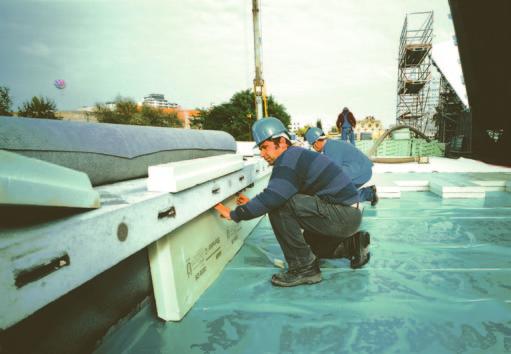 A separation layer on top of the reinforced concrete floor is not necessary.