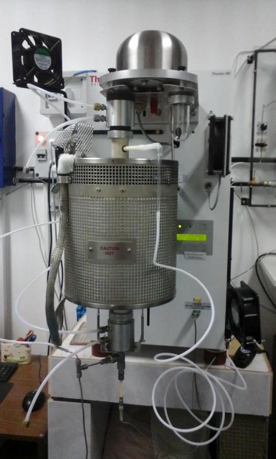 EXPERIMENTAL SETUPS FOR GASIFICATION THERMOGRAVIMETRIC ANALYSIS SYSTEM: To follow the kinetic of gasification reaction with CO 2 by measuring the temporal evolution of relative mass changes of the
