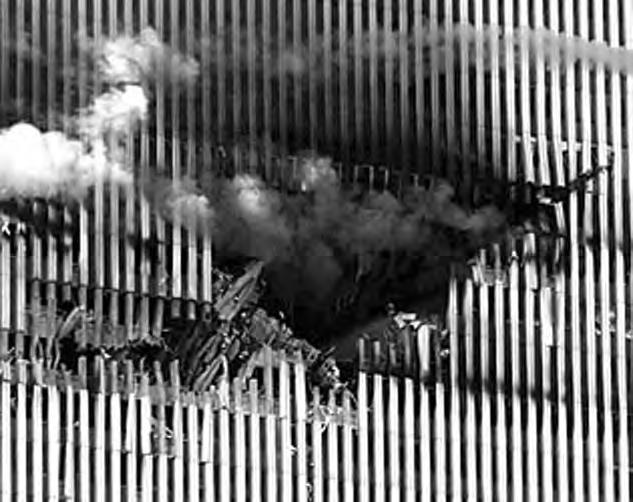 - 4 - Figure 5: Impact damage to the north face of WTC 1 [3] Figure 6: Impact damage to exterior columns of WTC 1 (left) and construction of the