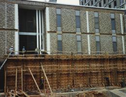 BLINDSIDE WALLS When a contractor has to form a concrete wall within a few inches of an existing structure,