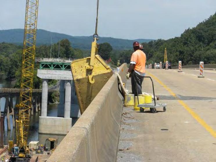 While the hole was being prepared, traffic control markers were set to block off the lefthand lane of the North bound AL-35 bridge.