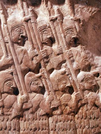 A stele (STEE-lee) is an upright slab of stone inscribed with letters and pictures to depict important events. This part of the Stele of the Vultures, which was found in Iraq, shows an attacking army.