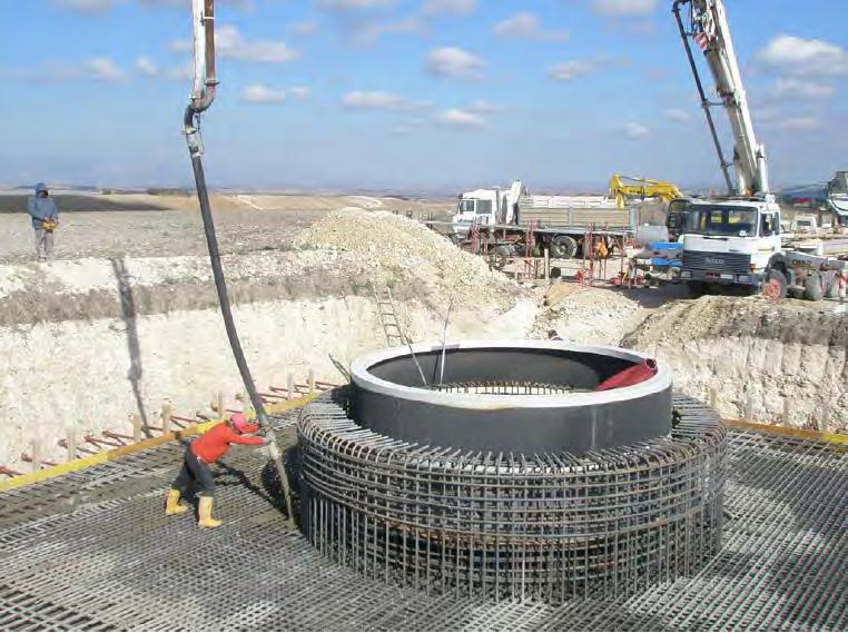 SRK Consulting: 478867:Inyanda - Roodeplaat WEF: Draft EIR Page 34 Figure 2-4: Concrete pouring of a turbine foundation note the tower base collar in the foreground (CES, 2014) Figure 2-5: The main