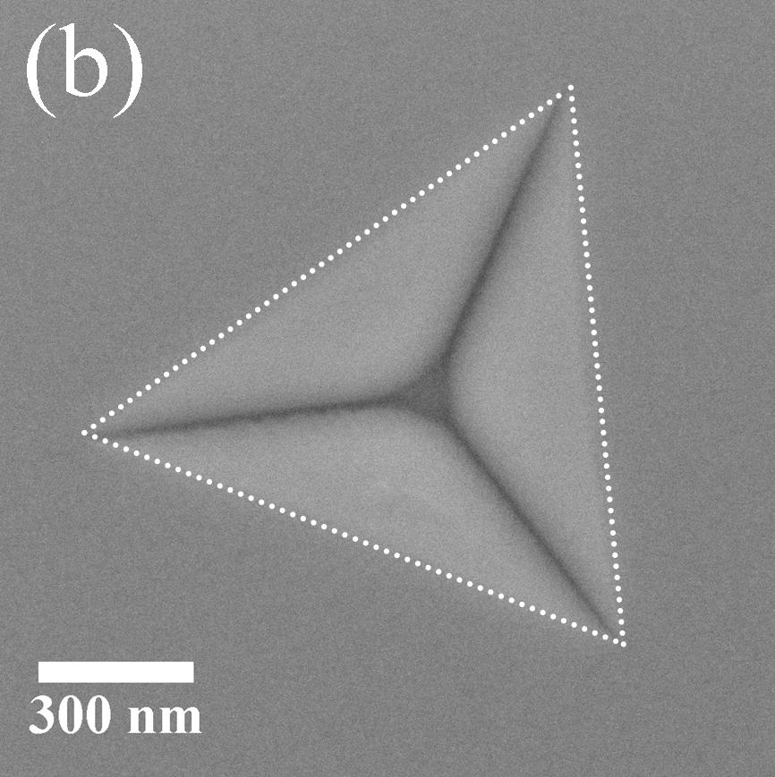 8: SEM scans of (a) a nanoindent in