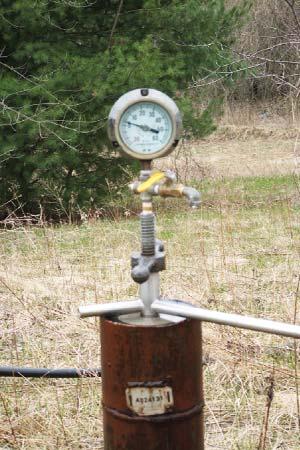 titled: Planning to Control the Flow : measure the pressure at a nearby flowing well using a pressure gauge and follow the procedures in Step 1 (above) if a nearby flowing well has been constructed