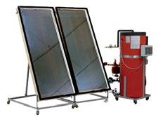 The system consists of a copper absorption plate solar collector connected to a coil heat exchanger in a hot water tank.