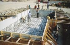 Planning should be given to the direction of overlaps, which should all run in a uniform direction. The concrete should then be placed on top of the membrane following the direction of overlapping.
