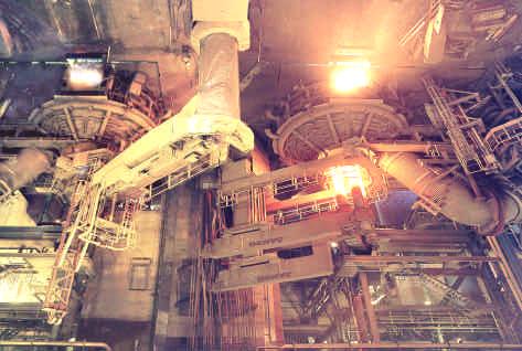 Figure 10: Electric Arc Furnaces CONARC CST After completion of the decarburisation process, the top lance is slewed away and the electrodes are brought into operating position.