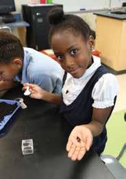 OSU Extension leads a program in Cleveland and Cincinnati that is inspiring children such as 8-year-old Jamir Green to be scientists when they grow up.