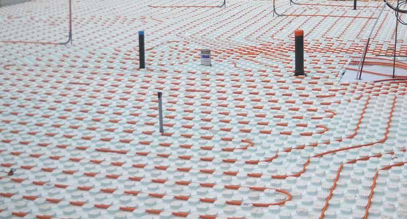 RADIANT FLOOR HEATING INSULATION INSULATION PANEL WITH A MULTIDIRECTIONAL TUBE RETAINING DESIGN AND THE ISOCLICK ALIGN CLIPPING SYSTEM Insulation under the concrete slab.