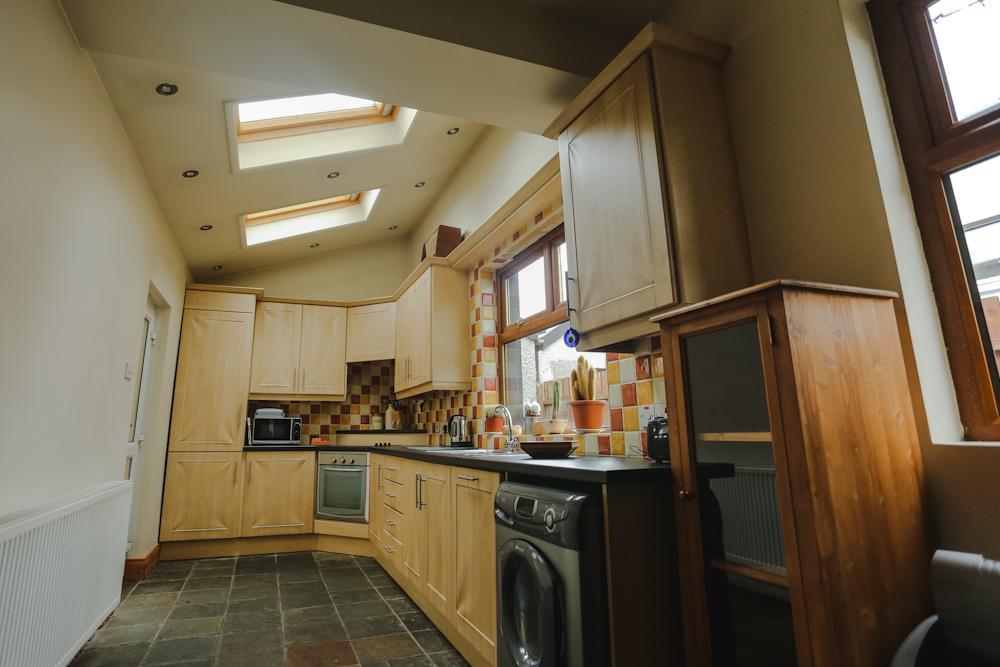 Superb Kitchen: 21/9 x 7/9 with gable window plus Velux style Keylight roof windows in a pitched roof structure.