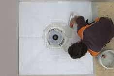 Apply Schluter SET TM, ALL-SET TM, FAST-SET TM, Place the KERDI-SHOWER-ST tray and Completely fill the step in the shower tray or unmodified thin-set mortar to the substrate solidly embed in the
