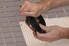 Install KERDI-KERECK at all inside and outside corners. When using KERDI-BOARD- SC, seal the curb to the base and walls using KERDI-KERECK and KERDI-BAND.