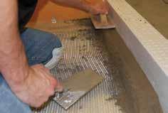 mortar, which is in turn covered with the Note: The thin-set mortar used in this step is to bed and support the tray only. KERDI membrane.