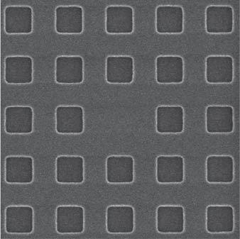 The photos show SEM images of the photomask before and after the repair. The pattern film is an MoSiON pattern film with a hole width of 350 nm.