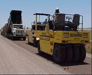 Binder application. The asphalt binder is applied to the surface with a distributor truck.