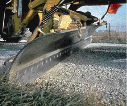 When blading, material should be pulled from the inslope area back up onto the roadway or shoulder surface and smoothened,