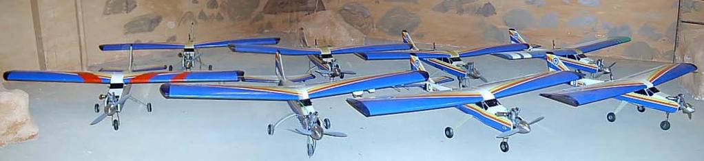 Figure 5. The fleet of 8 identical trainer ARF 6 aircraft used in the multi-uav testbed at MIT. 9 MHz Datalink GPS SAITO-91s 4-Stroke Engine Pitot-Static Air data Figure 6.