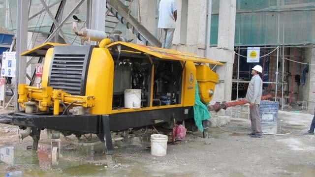 Fixed concrete pump serving