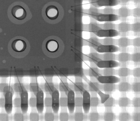 Board Assembly Figure 12 Typical X-ray Image of Soldered VQFN Package Investigations have shown that voids in