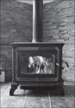 Q1. A wood burning stove is used to heat a room. Photograph supplied by istockphoto/thinkstock The fire in the stove uses wood as a fuel. The fire heats the matt black metal case of the stove.