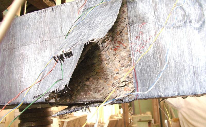 The failure started in most highly stressed fibers flowing rapidly by the rupture of the part of the CFRP sheet intersected by the main torsional crack.