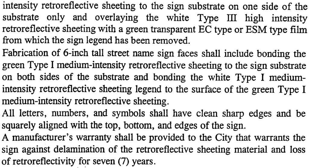 intensity retroreflective sheeting to the sign substrate on one side of the substrate only and overlaying the white Type III high intensity retroreflective sheeting with a green transparent EC type