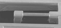 Electrically isolated SCS beam/comb finger (d) Si undercut SCS layer (20~100µm) Back-side view H.