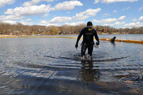 AQUATIC INVASIVE SPECIES (AIS) CHRISTMAS LAKE RESPONSE The District continued to partner with MN DNR, City of Shorewood, MN AIS Research Center and the Christmas Lake Homeowners Association on the