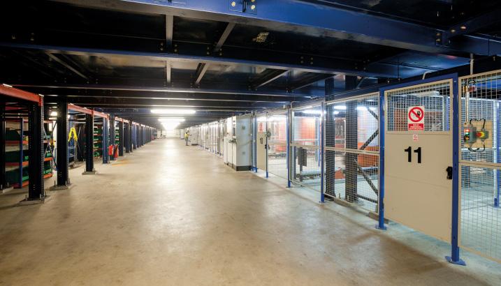 Height upgrade via trenching A portion of the clad-rack warehouse was built in a pit in order to not exceed the height stipulated by current legislation while maintaining the required storage