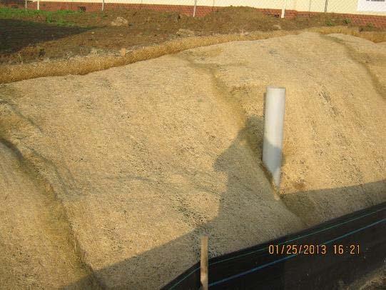 Mats Erosion Control Top is trenched in Rolled out perpendicular to