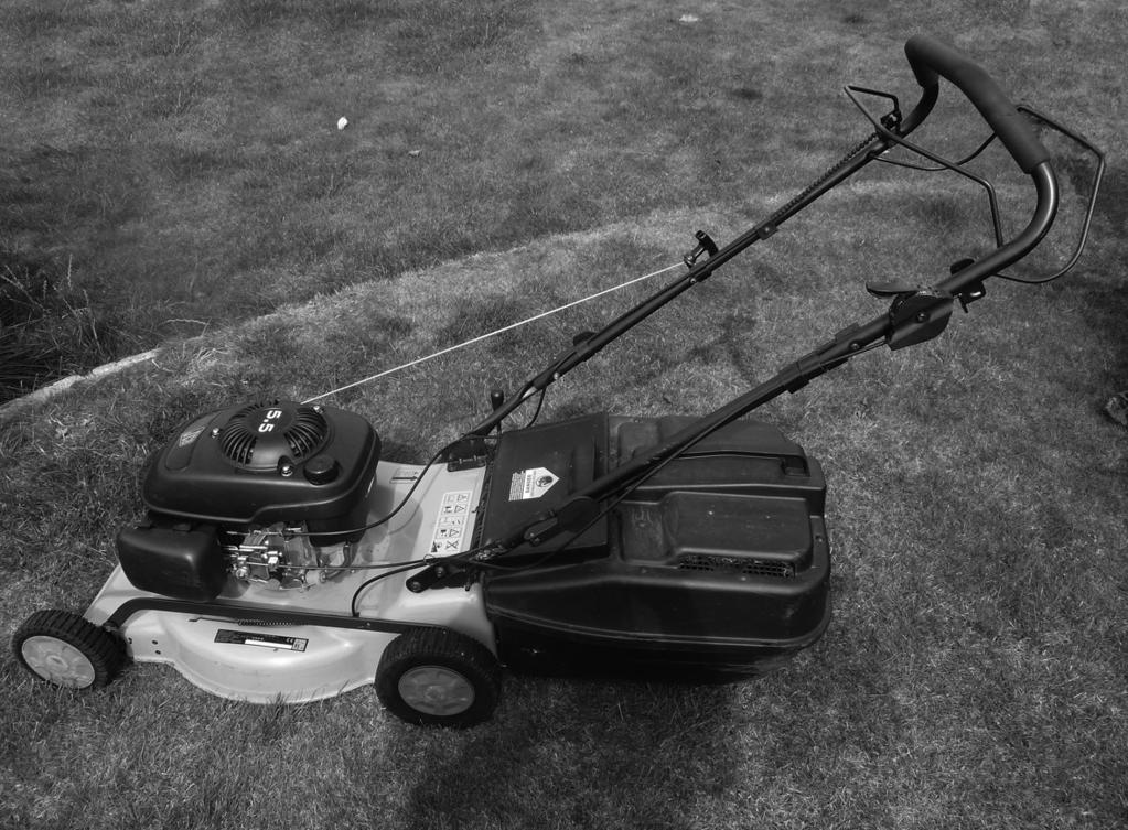 8 (b) The picture shows a garden lawn mower. The width of the cut is 30 cm. Other lawn mowers have a different width of cut.