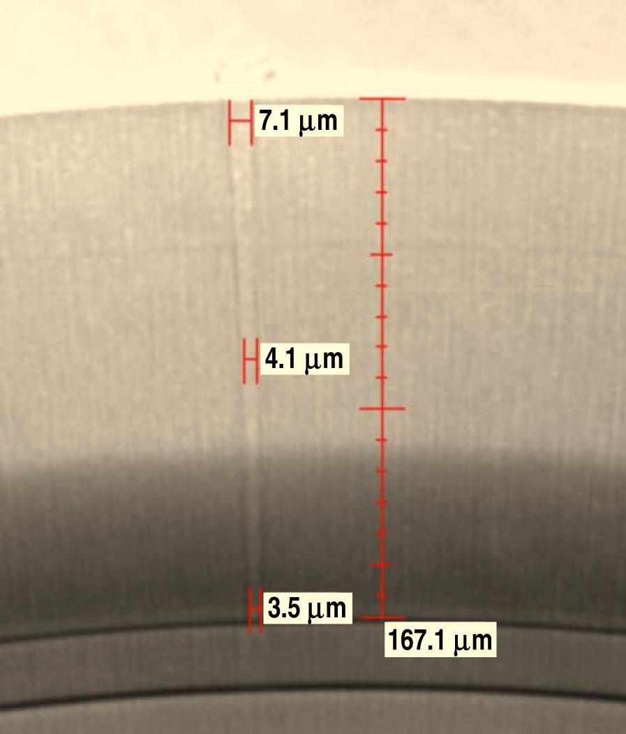 Fig. 4. An x-ray microscope 10 is used to analyze a high-aspect-ratio, small-diameter hole drilled with a nanosecond laser 8 utilizing the SuperPulse format.
