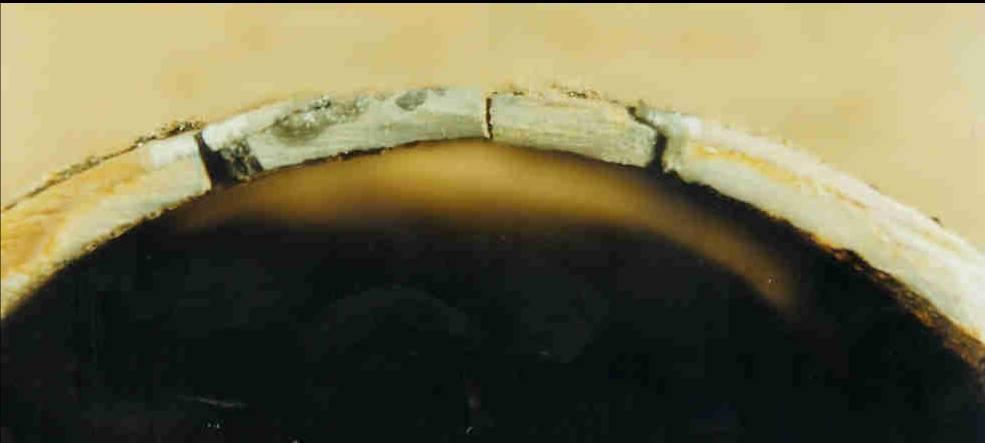 Location where the graphitic corrosion had fully penetrated the wall thickness and resulted
