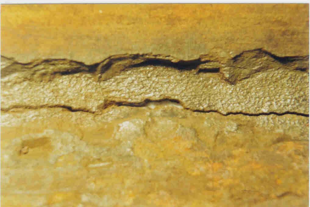 The dense corrosion product had broken off along the crack