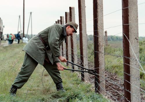 In May 1989, the government stunned its Soviet bloc neighbours by tearing down its border fence with Austria This allowed free transit between the two