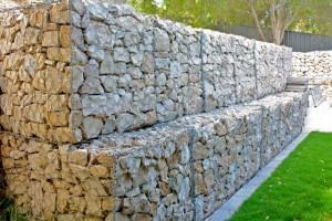Types of Retaining Walls Gabion Wall Made of rectangular containers Fabricated of heavily galvanized wire, filled with stone and stacked on one