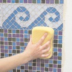 Installing Paper Faced Mosaic Glasstile Using the Direct Bond Method. After cheese clothing allow grout to set up followed by smoothing the grout joints with a lightly damp sponge.