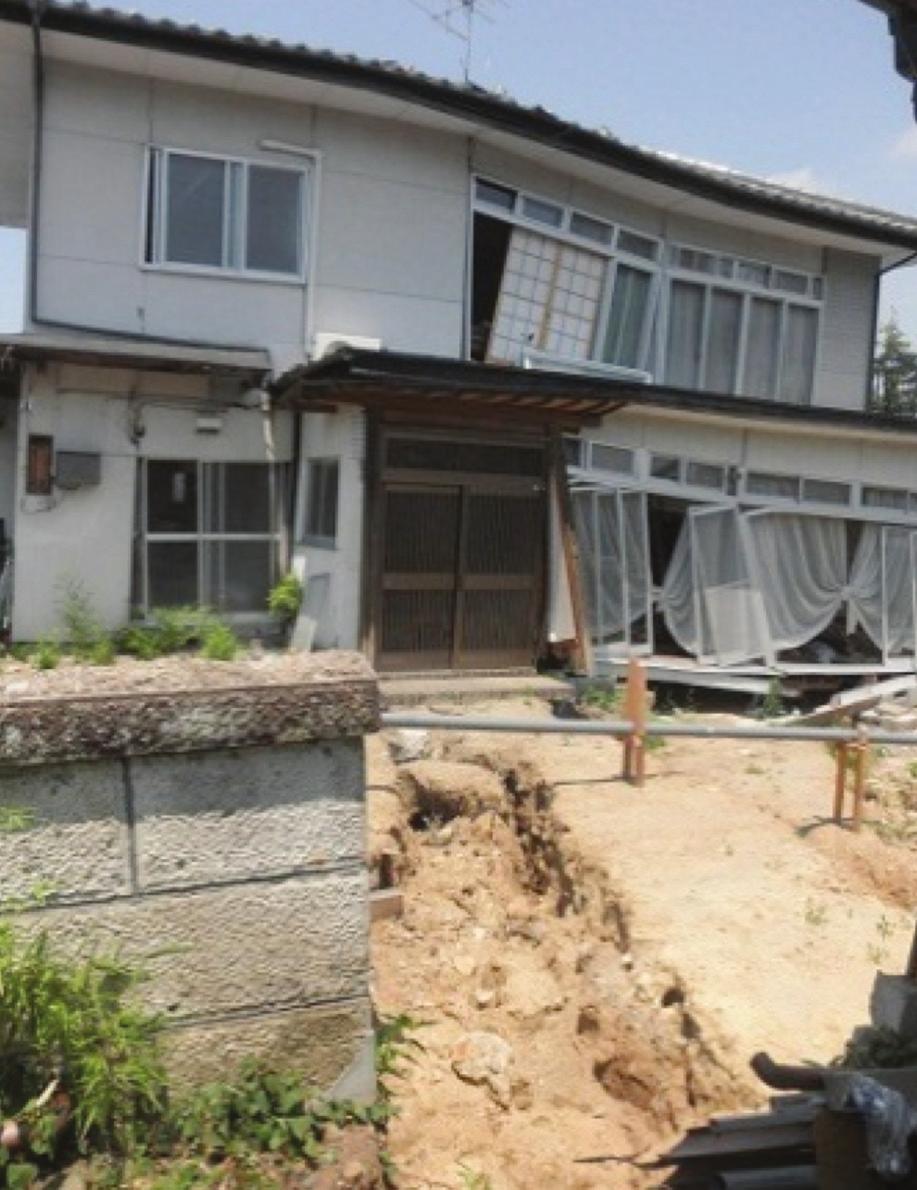 FIGURE 10: Houses damaged by landslides landslides following the GEJE were developed before the act came into effect.