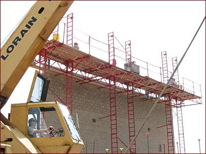 End Frames as Ladders Where end frames are designed to be used as a ladder or where bolted-on ladders