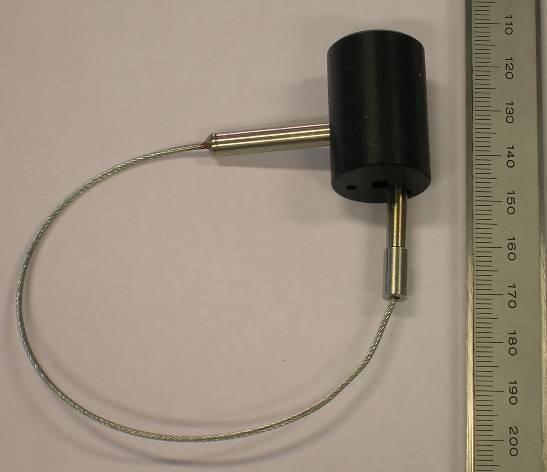 Figure 1 JRC patented passive seal closed with wire. Figure 2 JRC patented passive seal mounted to a container. The passive transponders are the core of the seal.