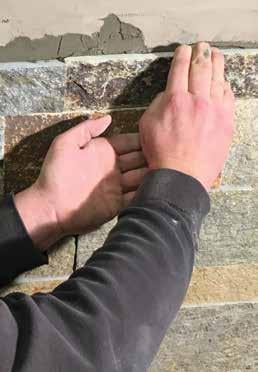 SPEC MIX XP00 IS THE LOW-SAG, HIGH BOND ADHESIVE MORTAR THAT MAXIMIZES DAILY PRODUCTION KEY FEATURES Engineered to adhere thin cut natural and manufactured masonry veneer units Performance additives