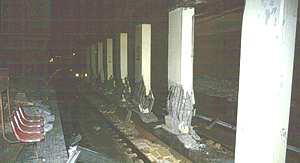 Figure 1 - Collapse of the central columns of Dakai tube station, Kobe, Japan [Iwatate, 1998] The configuration of the station in plan is similar to a rectangle 120m long and 17m wide in the
