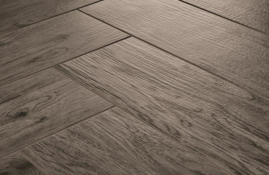 WARMTH & COMFORT Alterna may look like traditional tile, but it feels entirely different.